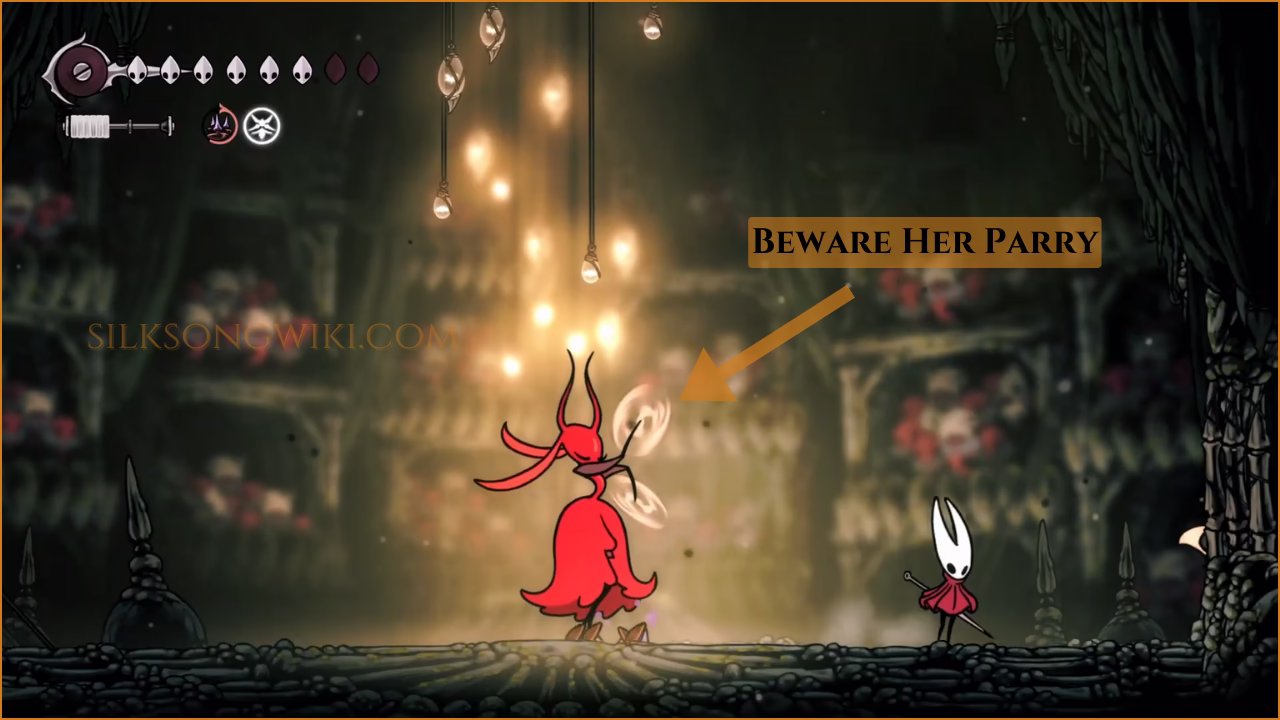 A visual warning showing Karmelita's parry-able stance.