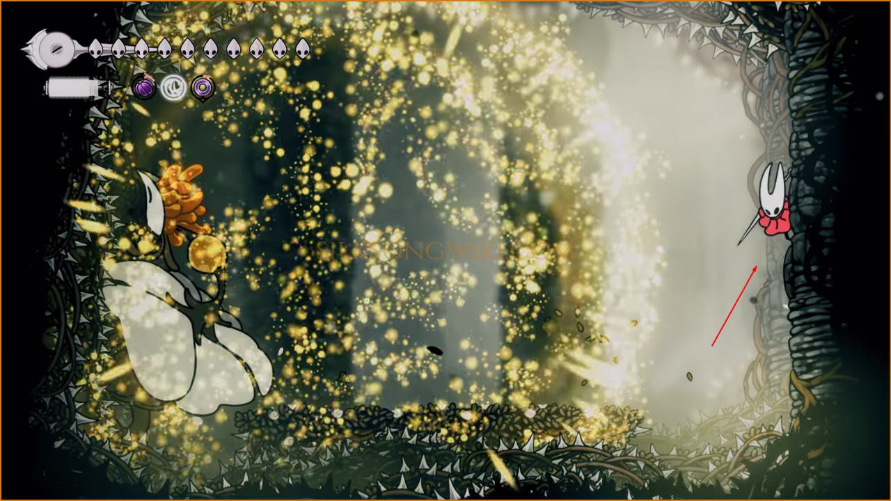 A screenshot showing Hornet clinging to the safe wall while Nyleth is on the opposite, thorny wall.