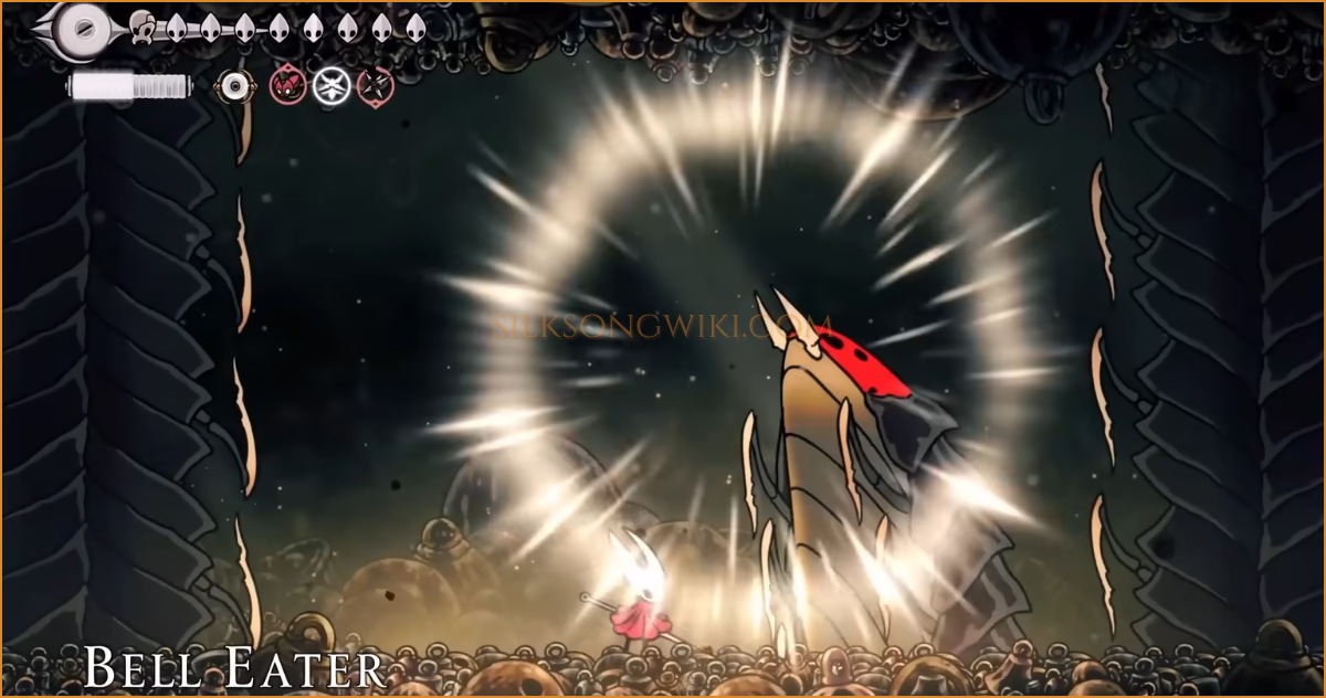 The Bell Eater bursts from the ground as the boss battle begins.