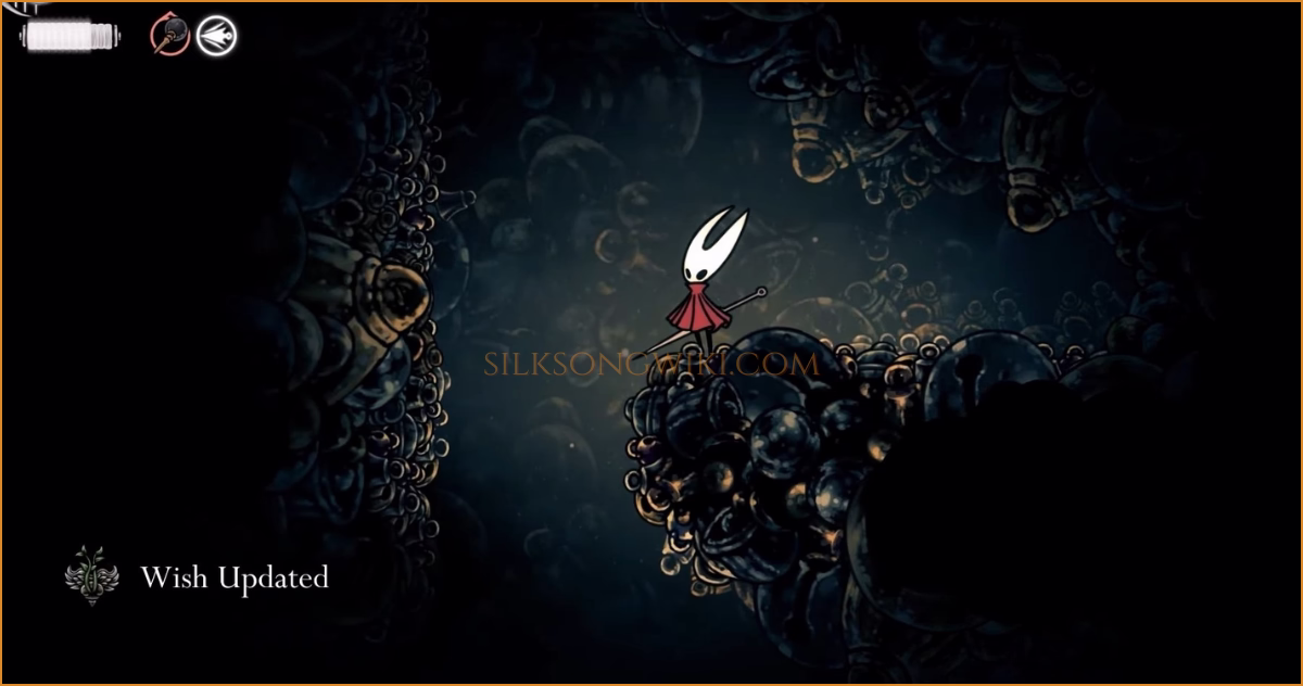 The in-game UI showing the quest objective updating to "Return to the Wishwall."